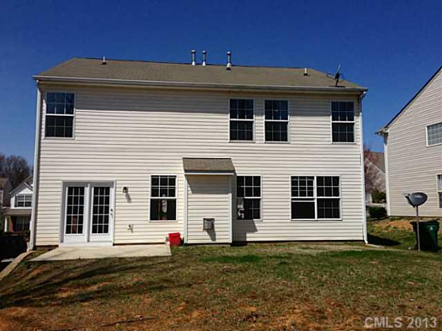 11406 Erwin Ridge Avenue Charlotte, NC 28213 - Photo 16 of 16 a front view of a house with a yard