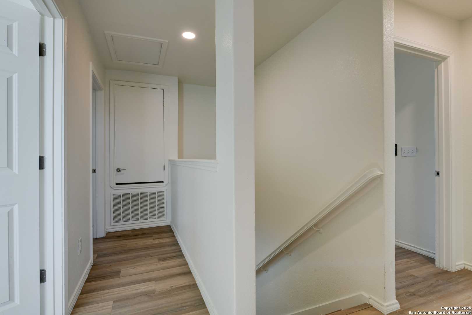 9447 Copper Mist Converse, TX 78109 - Photo 10 of 25 a view of a hallway with wooden floor and closet