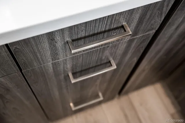 a kitchen with stainless steel appliances granite countertop a stove and a sink
