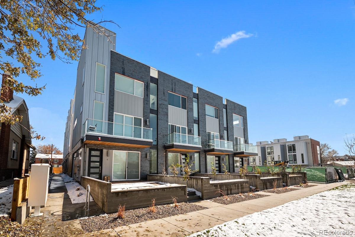 1624 Irving Street, Unit 1 Denver, CO 80204 - Photo 2 of 35 a front view of a building with street view