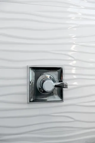 a bathroom with a sink mirror toilet and bathtub