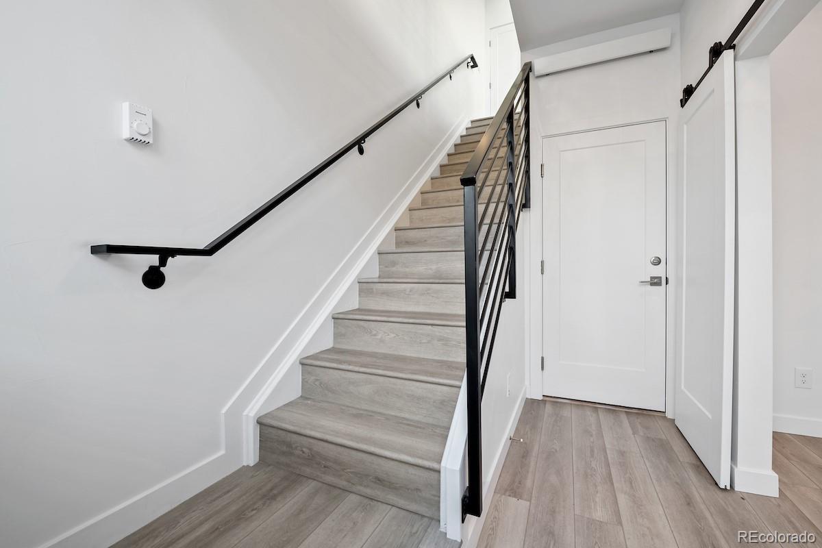 1624 Irving Street, Unit 1 Denver, CO 80204 - Photo 5 of 35 a view of entryway with wooden floor
