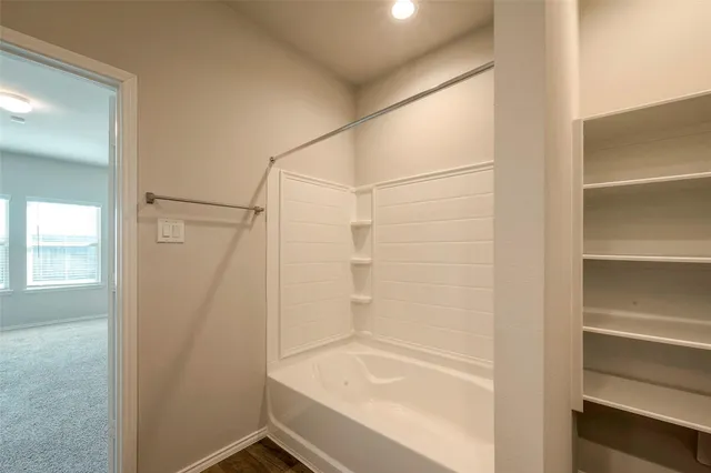 a bathroom with a bathtub