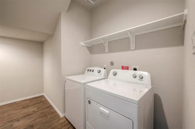 a utility room with dryer and washer