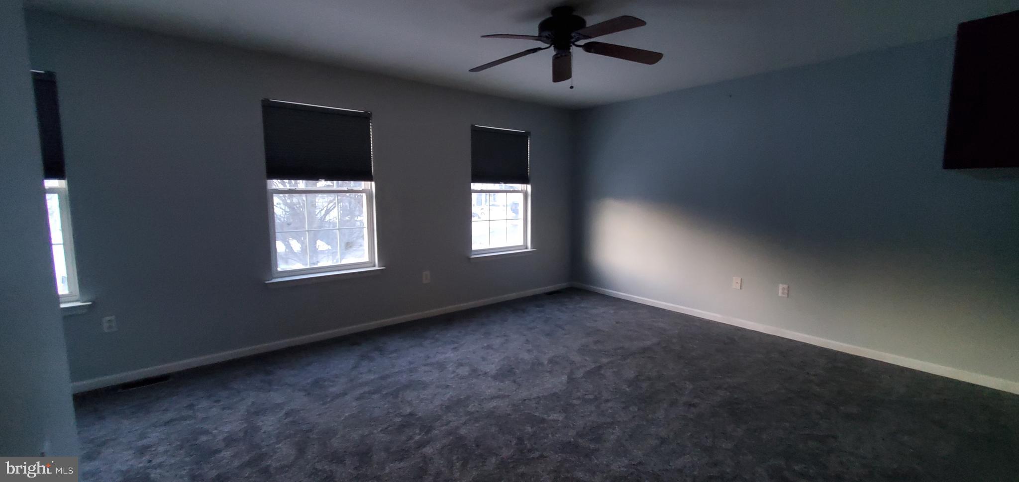 49 Villa Avenue Boyertown, PA 19512 - Photo 12 of 30 a view of an empty room with a window and a kitchen