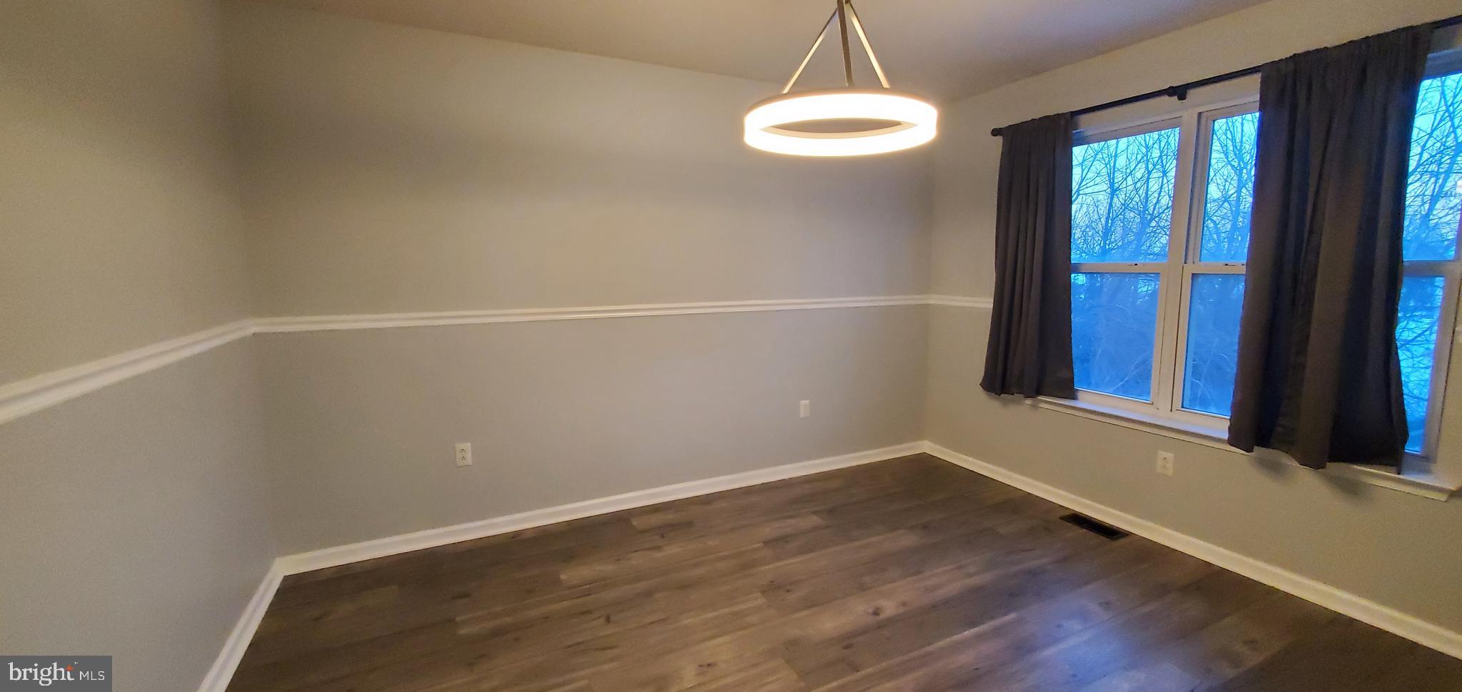 49 Villa Avenue Boyertown, PA 19512 - Photo 8 of 30 a view of a room with wooden floor and window