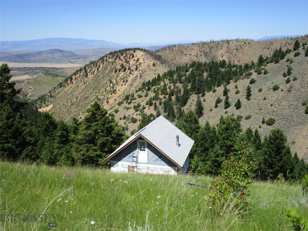 20600 Pole Gulch Road Three Forks, MT 59752 - Photo 1 of 1 20+/-A with cabin and views of the Clarkston valley.
