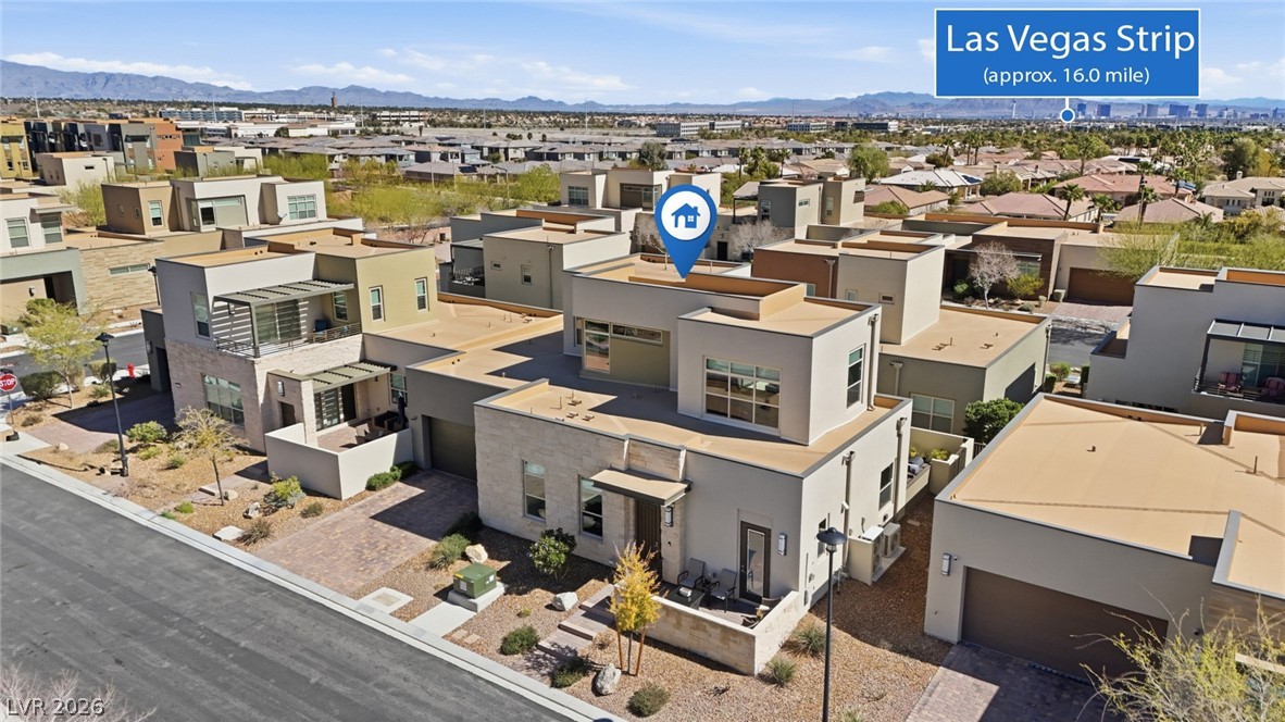4246 Swift Street Las Vegas, NV 89135 - Photo 59 of 71 Aerial view of residential area featuring mountains