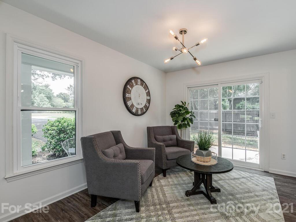 5024 Rea Road Charlotte, NC 28226 - Photo 6 of 19 a living room with furniture a window and a potted plant