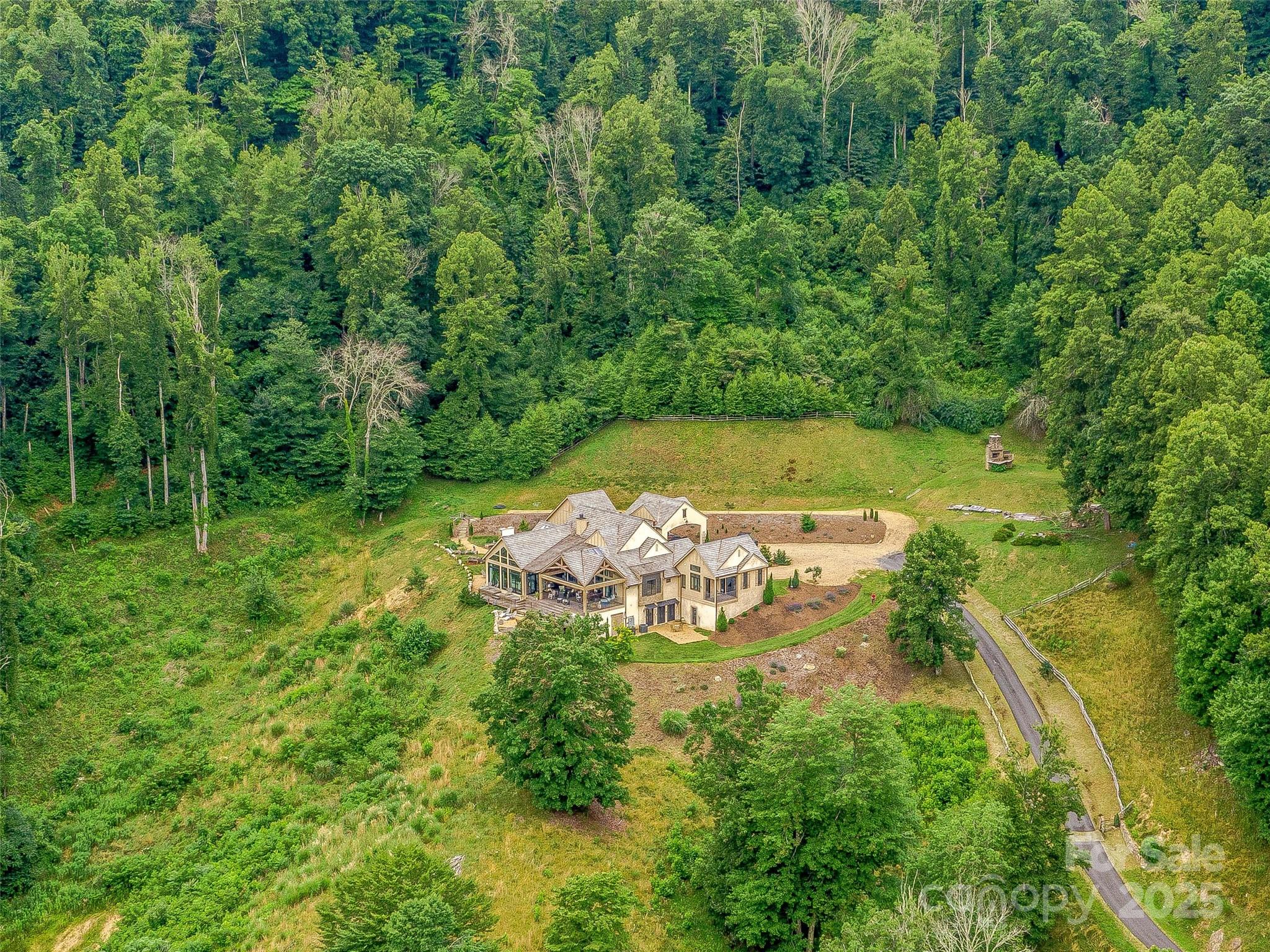 384 Doan Town Road Burnsville, NC 28714 - Photo 13 of 44 a view of a lake with green space