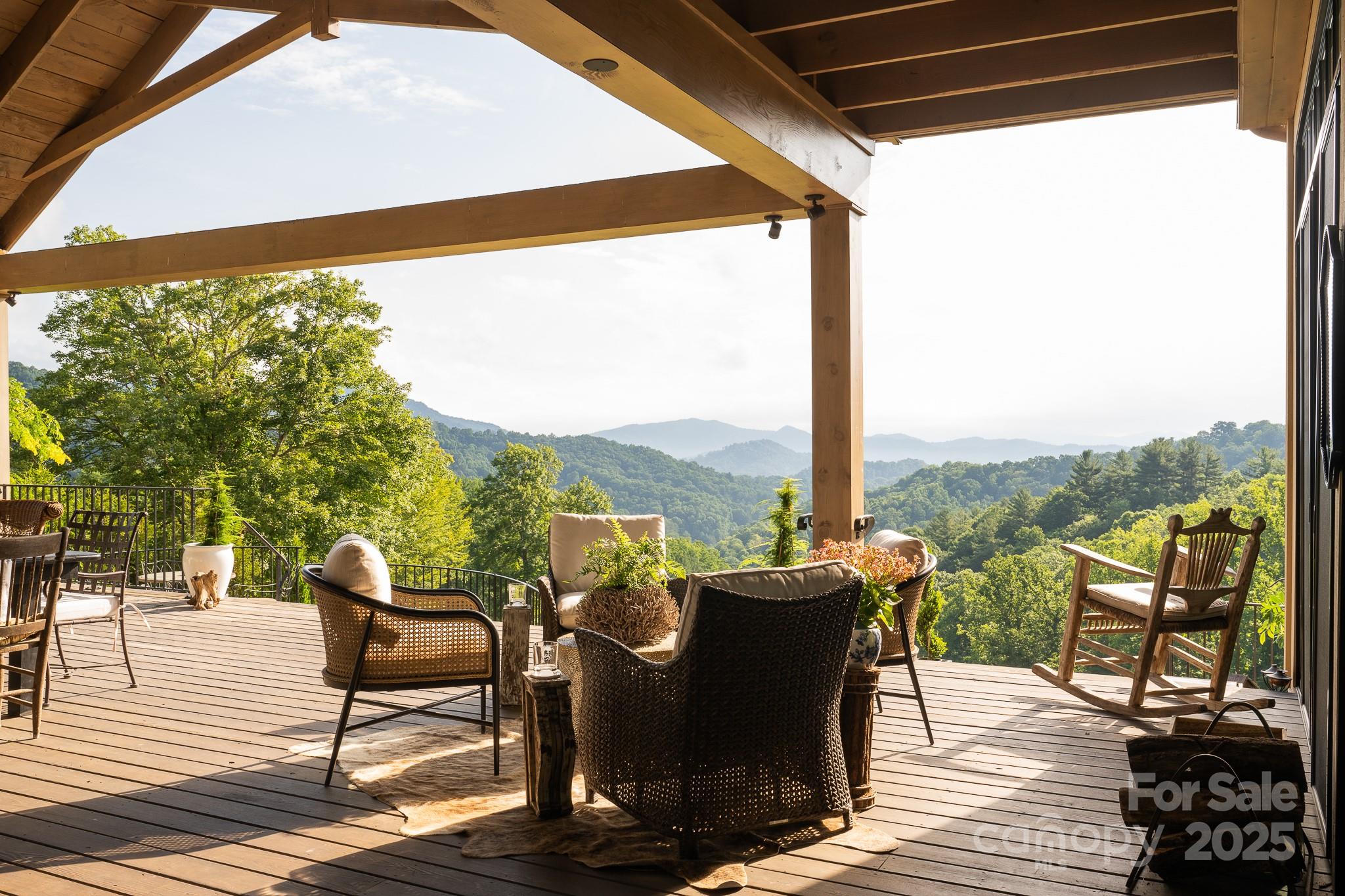 384 Doan Town Road Burnsville, NC 28714 - Photo 20 of 44 a view of a balcony with lake view and mountain view