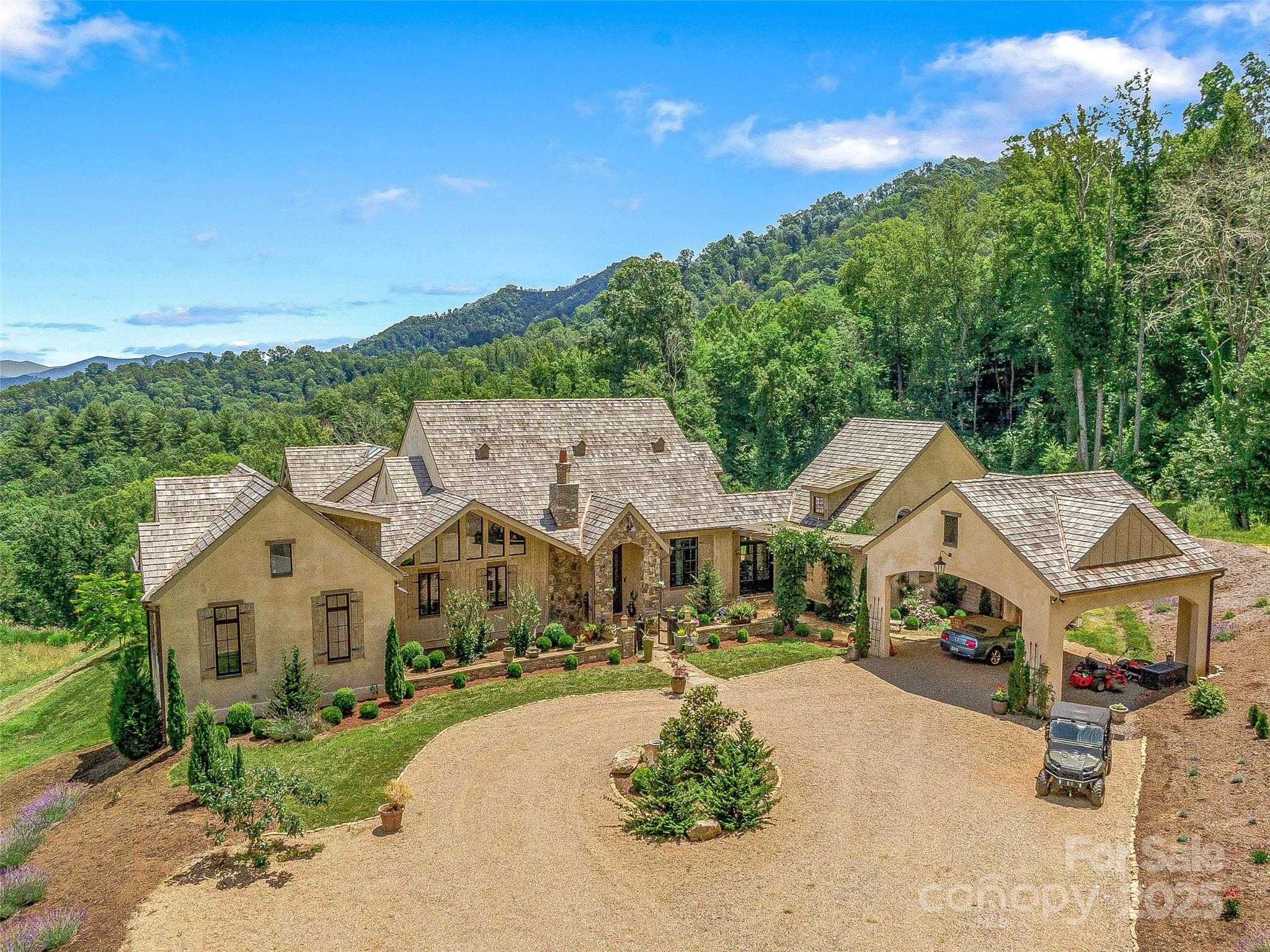 384 Doan Town Road Burnsville, NC 28714 - Photo 2 of 44 a view of a town with houses