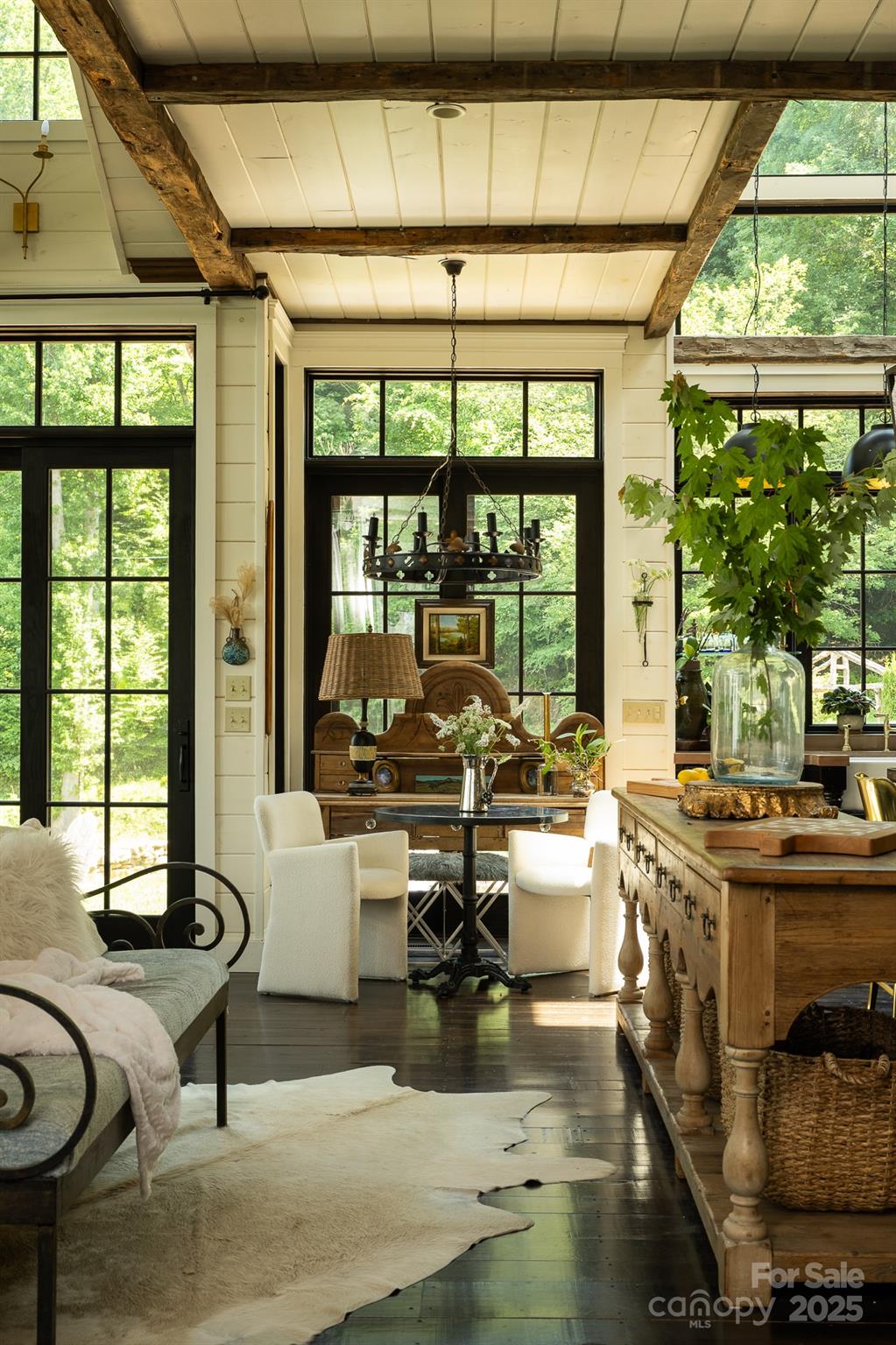 384 Doan Town Road Burnsville, NC 28714 - Photo 27 of 44 a living room with furniture and a large window