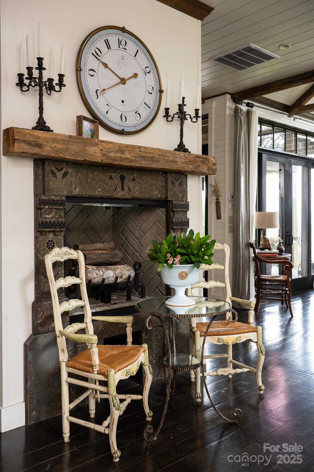 384 Doan Town Road Burnsville, NC 28714 - Photo 29 of 44 a view of a dining room with furniture window and wooden floor