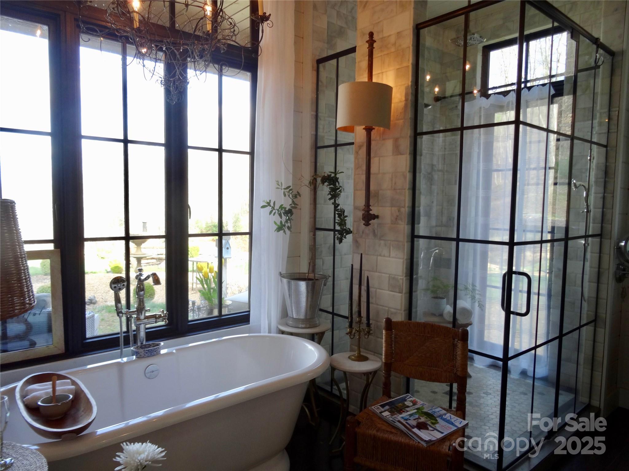 384 Doan Town Road Burnsville, NC 28714 - Photo 32 of 44 a bathroom with a bathtub and a sink