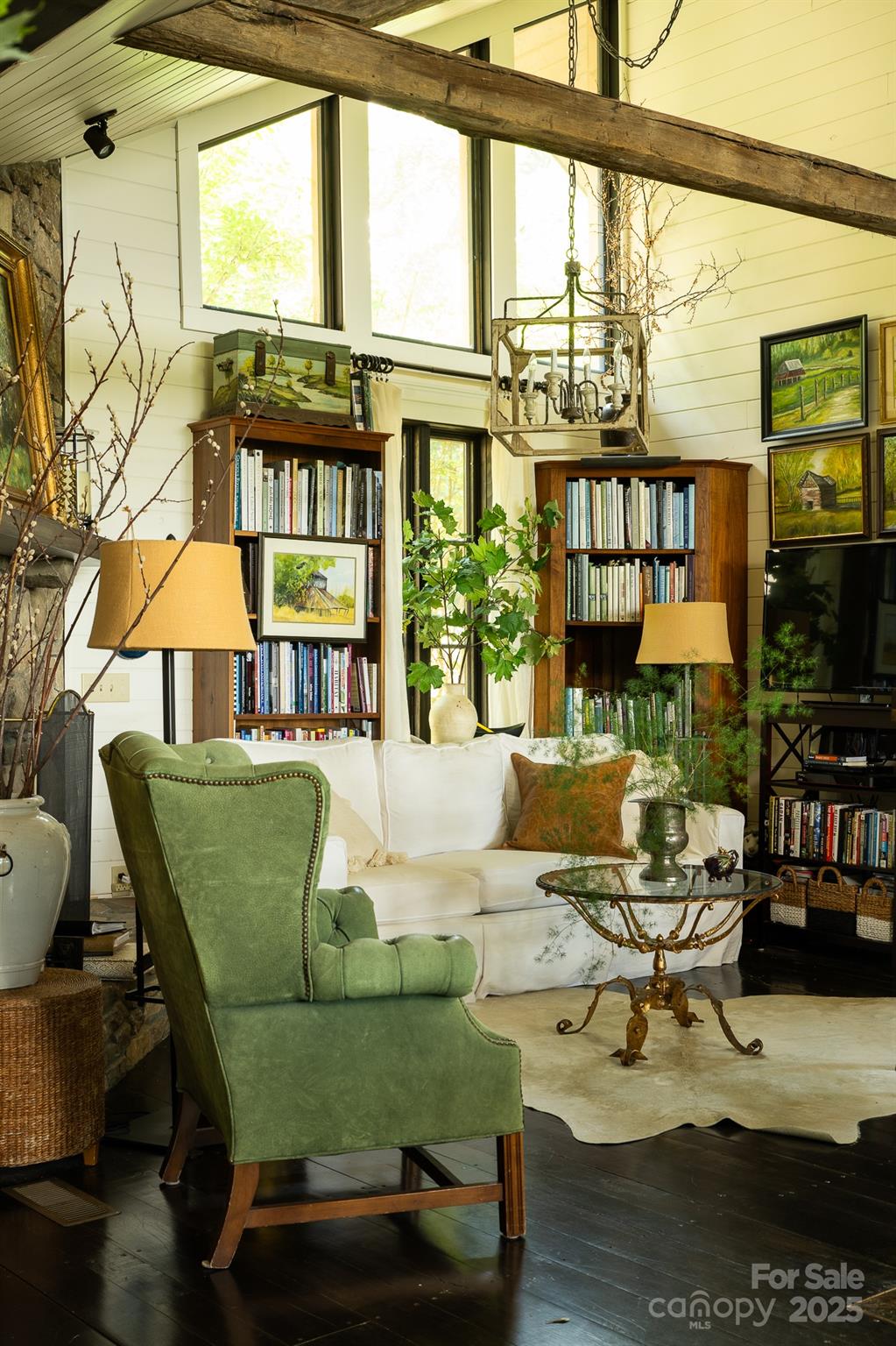 384 Doan Town Road Burnsville, NC 28714 - Photo 38 of 44 a living room with furniture and a floor to ceiling window