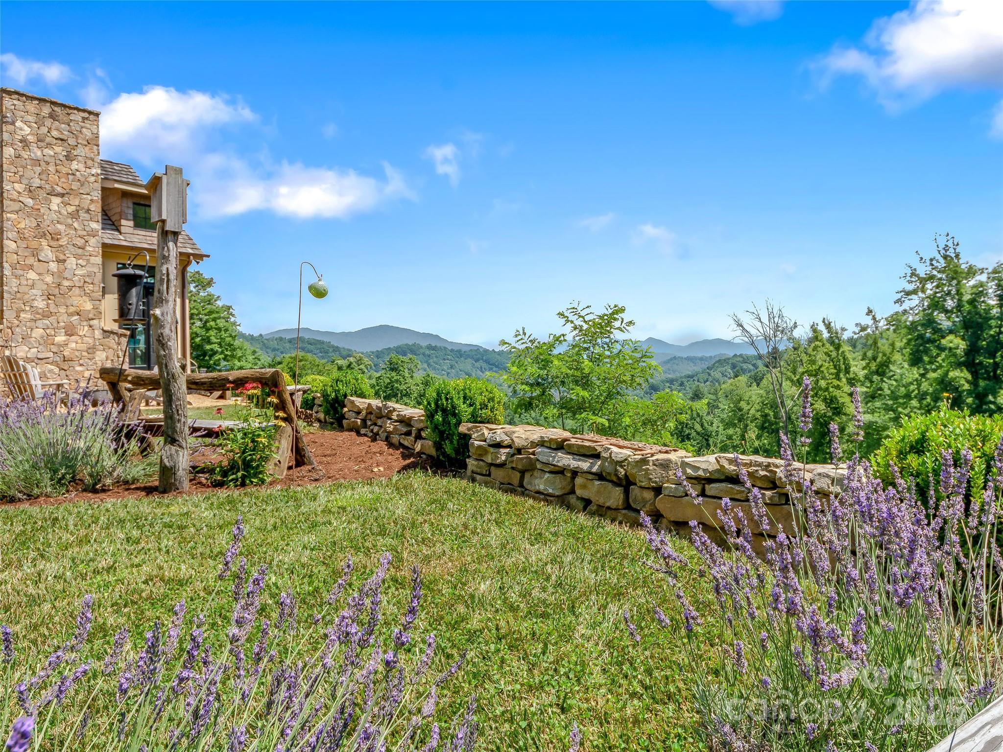 384 Doan Town Road Burnsville, NC 28714 - Photo 9 of 44 a view of a street with houses