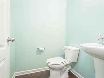 145 Townview Drive Woodstock, GA 30189 - Photo 9 of 21 a bathroom with a toilet and a sink
