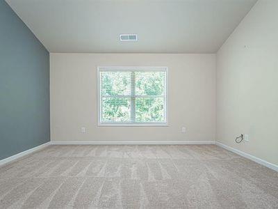 145 Townview Drive Woodstock, GA 30189 - Photo 10 of 21 an empty room with a window