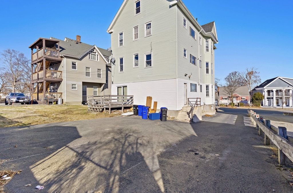 403 Ferry Street, Unit 2 Malden, MA 02148 - Photo 15 of 17 a view of multiple houses with outdoor space