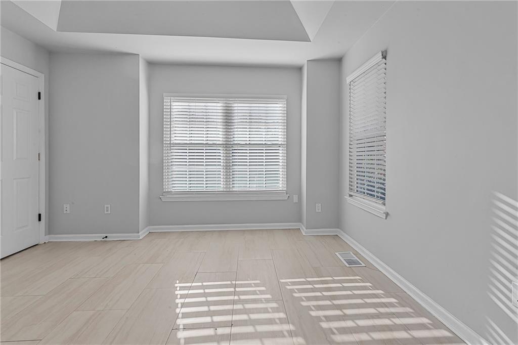 1731 Pryor Road Southwest, Unit 301 Atlanta, GA 30315 - Photo 17 of 29 a view of an empty room with a window