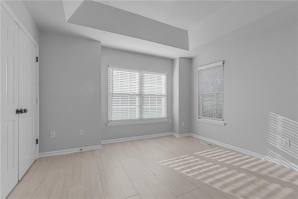 1731 Pryor Road Southwest, Unit 301 Atlanta, GA 30315 - Photo 18 of 29 a view of an empty room with a window