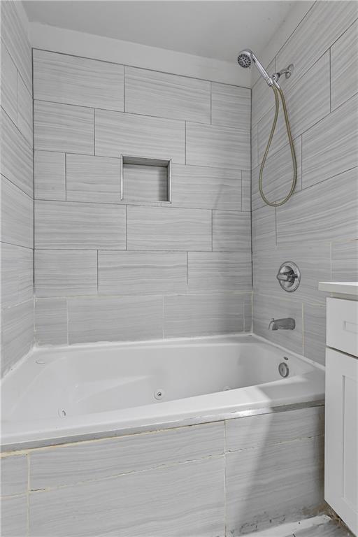 1731 Pryor Road Southwest, Unit 301 Atlanta, GA 30315 - Photo 21 of 29 a bathroom with a shower and a bath tub