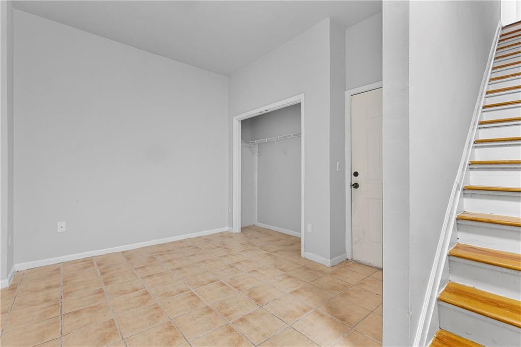 1731 Pryor Road Southwest, Unit 301 Atlanta, GA 30315 - Photo 26 of 29 wooden floor in an empty room
