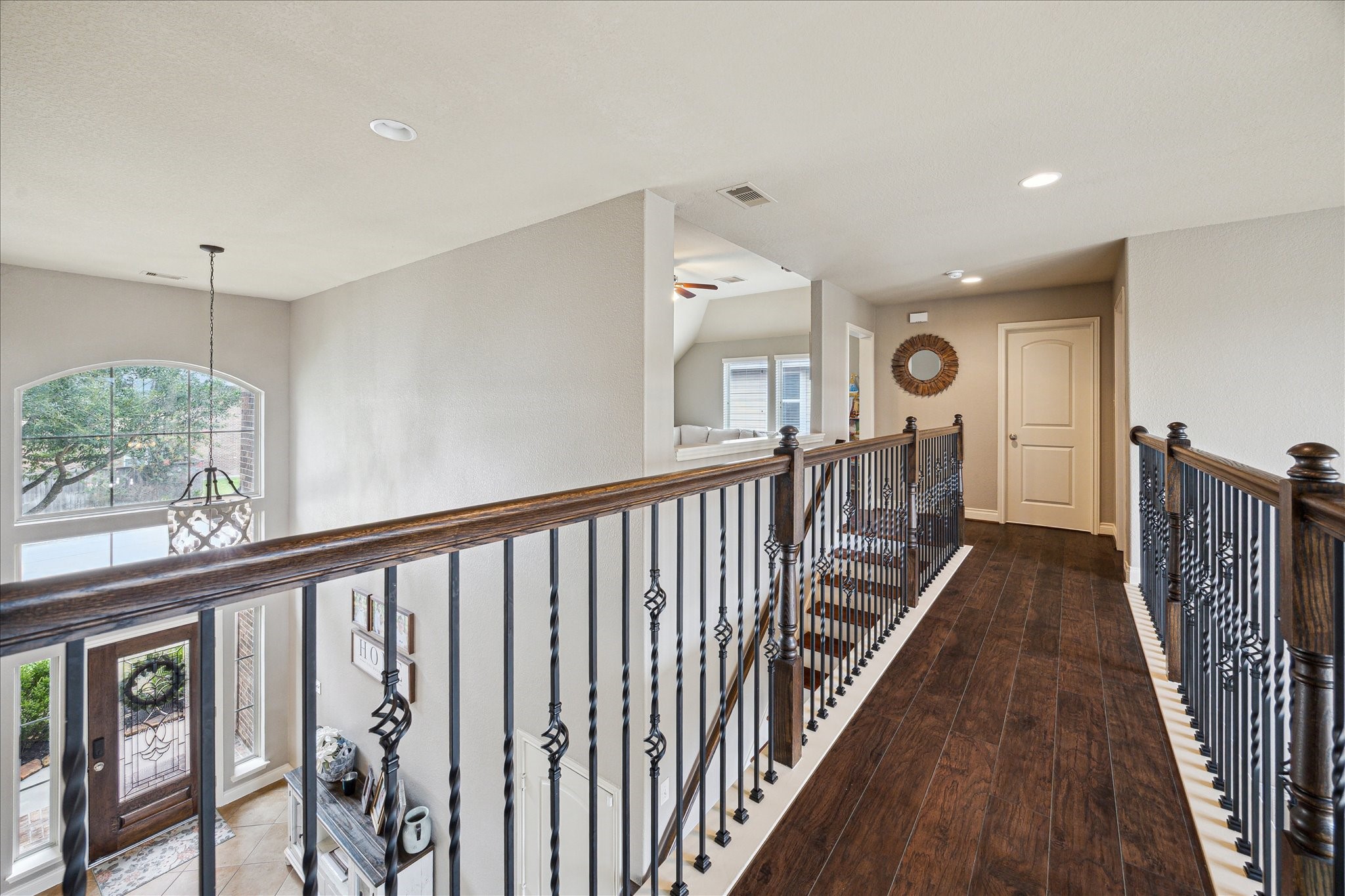 28919 Crested Butte Drive Katy, TX 77494 - Photo 25 of 36 Right upstairs is the second floor balcony overlooking the living room and entryway.