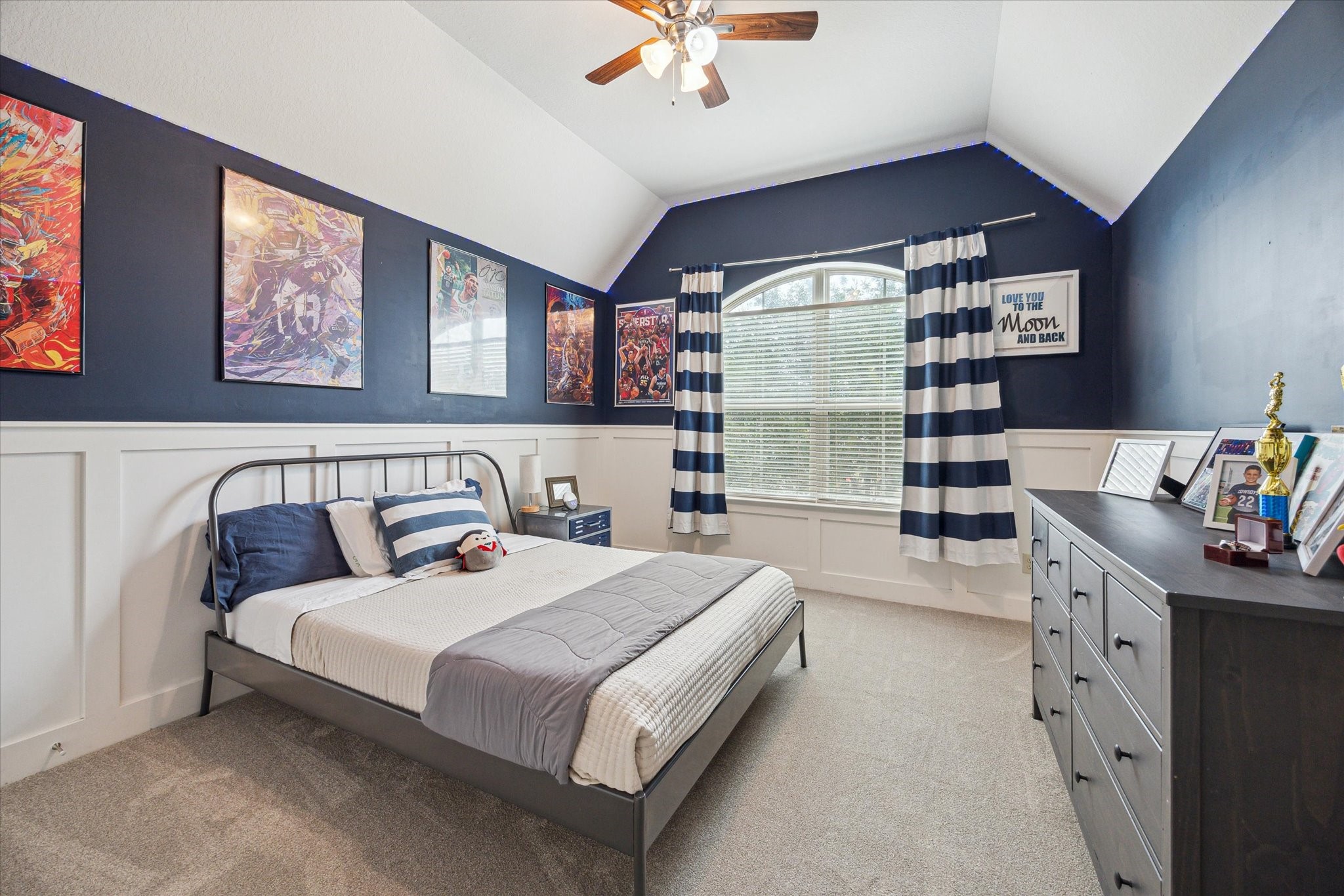 28919 Crested Butte Drive Katy, TX 77494 - Photo 28 of 36 Secondary bedroom features a
window, plush carpet, and custom paint.