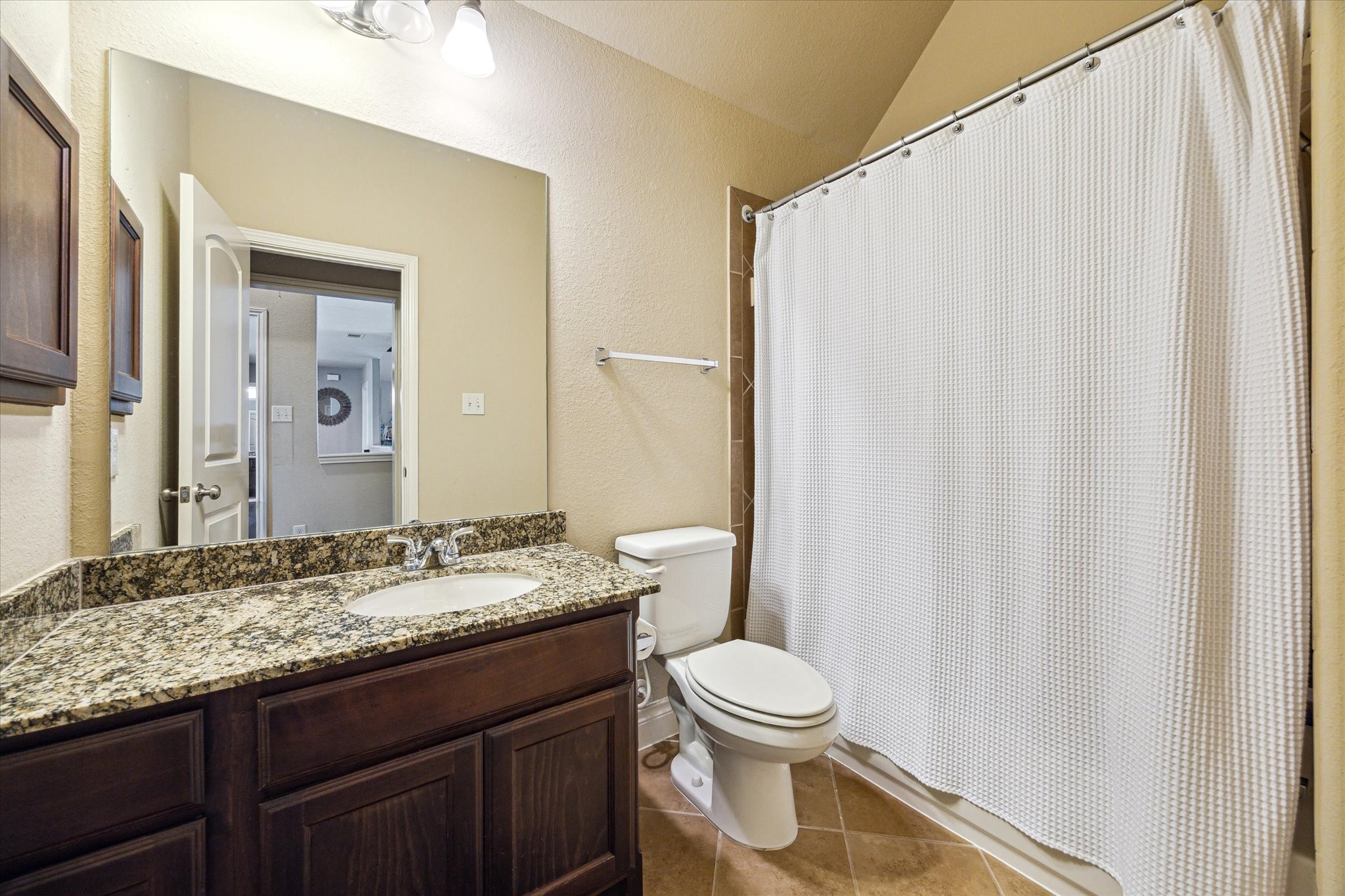 28919 Crested Butte Drive Katy, TX 77494 - Photo 31 of 36 Secondary bathroom features a
tub/shower combo and long vanity
with plenty of counter space.