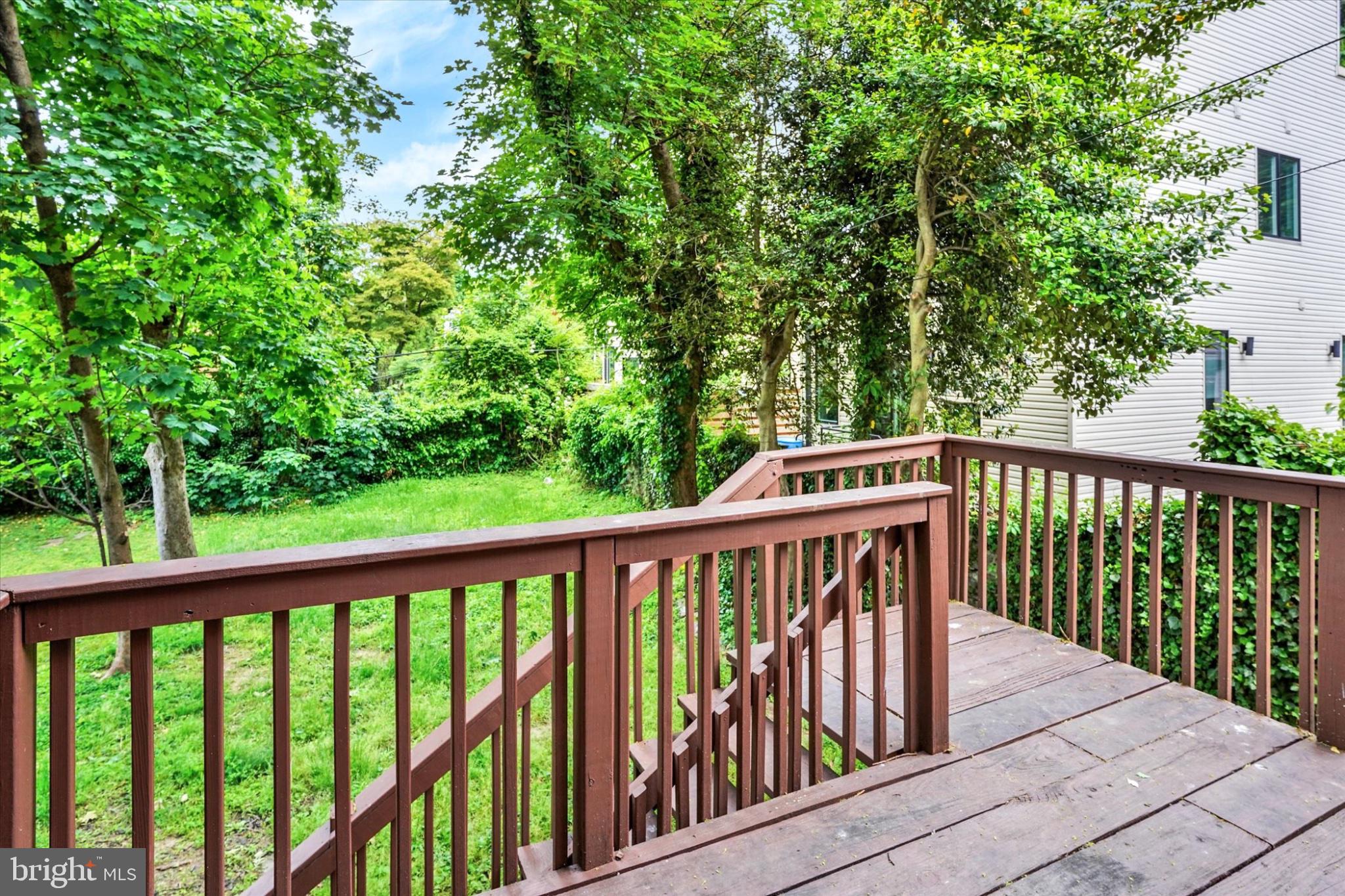 127 West Washington Lane Philadelphia, PA 19144 - Photo 28 of 29 Serene deck overlooking lush greenery.