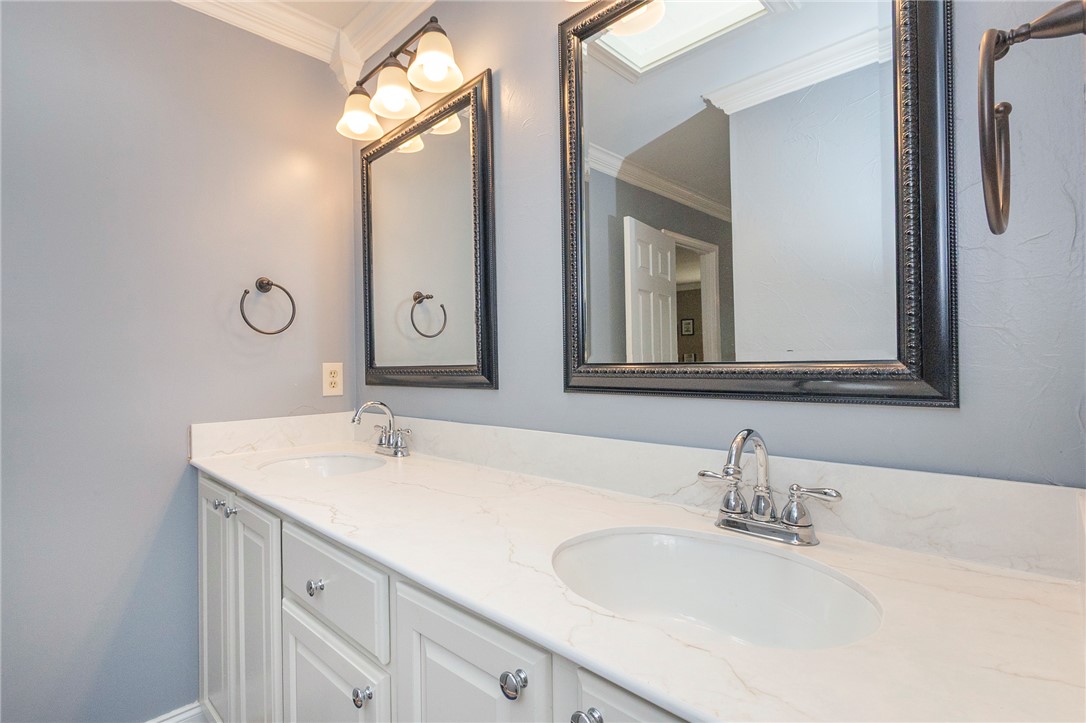 203 Oak Hollow Pendleton, SC 29670 - Photo 33 of 50 Double vanity with elegant mirrors and crown molding completes this well-appointed bath.
