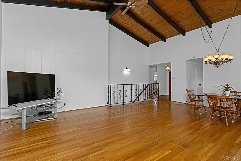 1551 Burgundy Road Encinitas, CA 92024 - Photo 15 of 31 a living room with furniture and a flat screen tv
