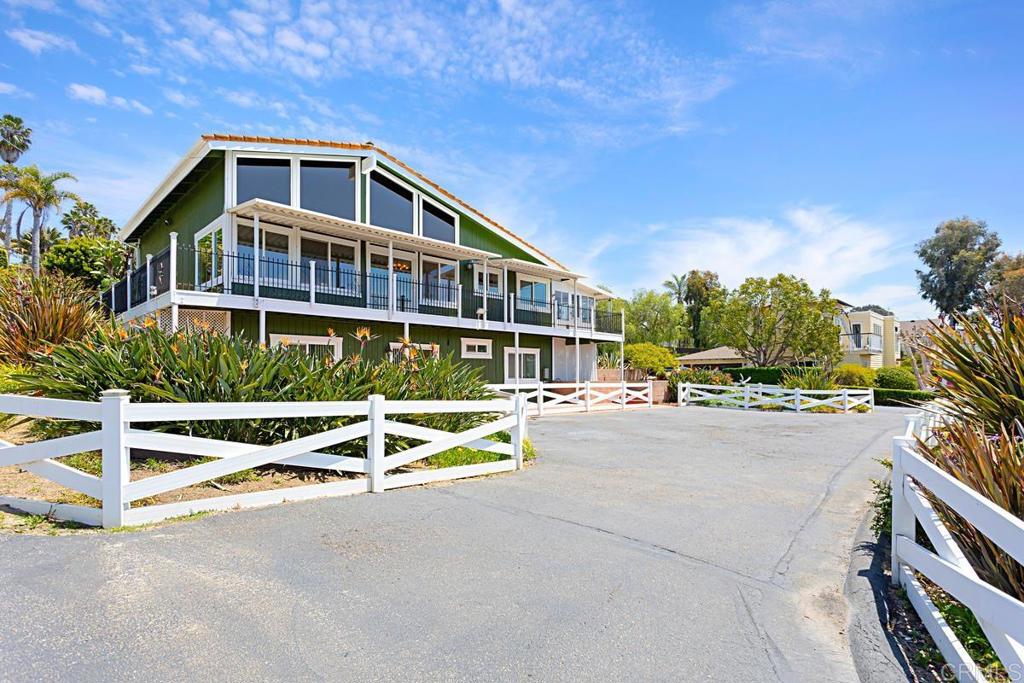 1551 Burgundy Road Encinitas, CA 92024 - Photo 3 of 31 a view of a house with pool and sitting area