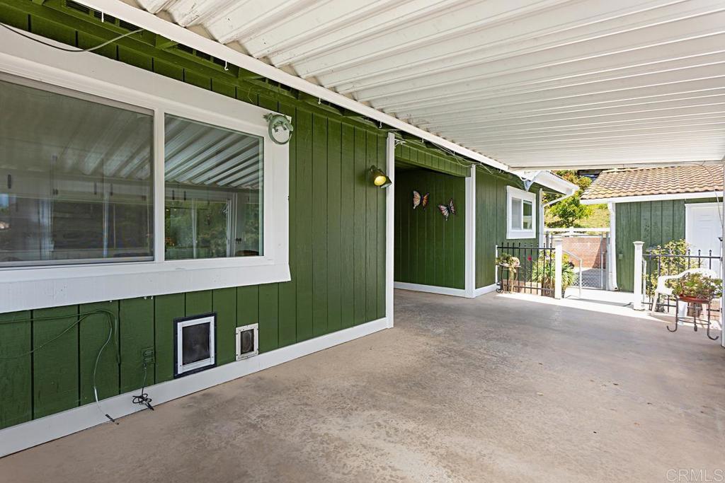 1551 Burgundy Road Encinitas, CA 92024 - Photo 5 of 31 a view of a house with a porch