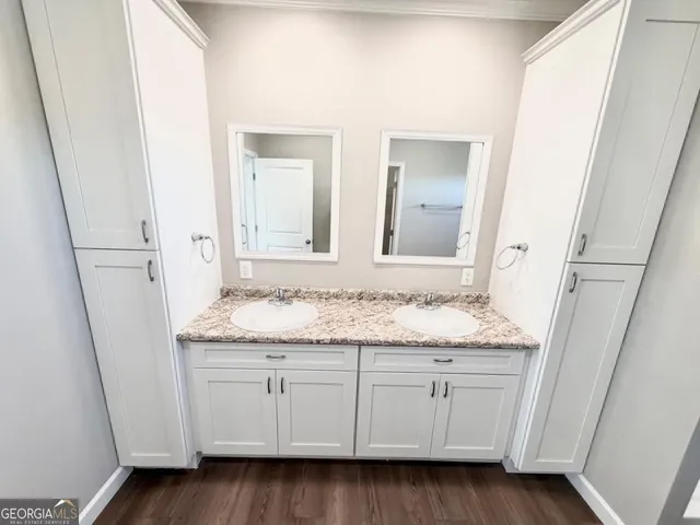 a bathroom view of a toilet and a shower