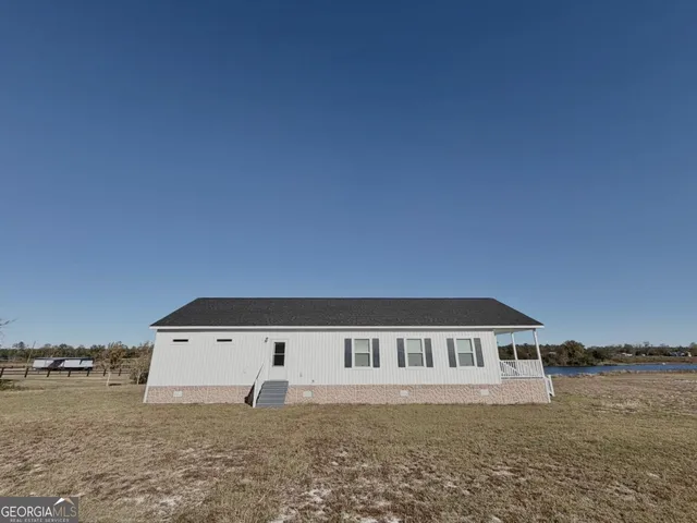 a view of mountain with lake view