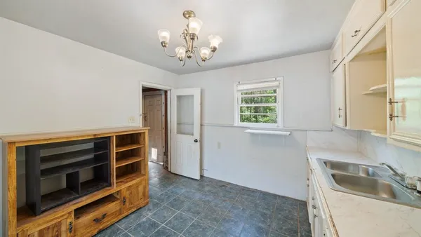 a view of kitchen and windows