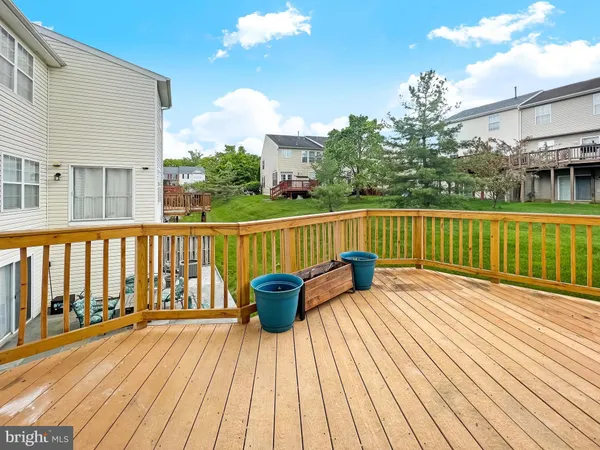 a view of roof deck with patio