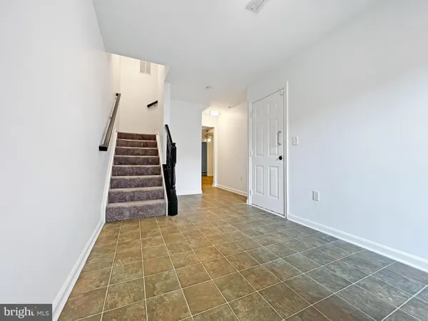 a view of entryway with stairs