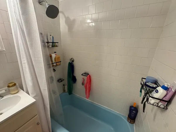 a bathroom with a sink and a tub