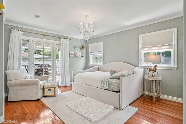 a bed room with a bed and a couch