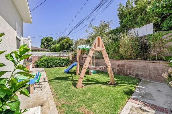a view of a garden with a slide