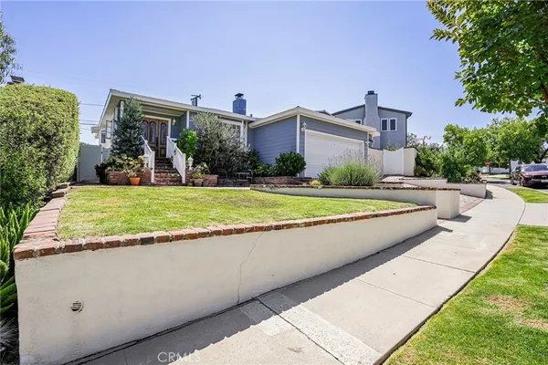 a view of a house with a swimming pool