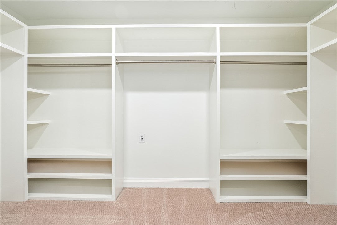 1657 Abby Road Auburn, AL 36830 - Photo 22 of 39 This spacious closet features ample shelving and hanging rods for organized storage.