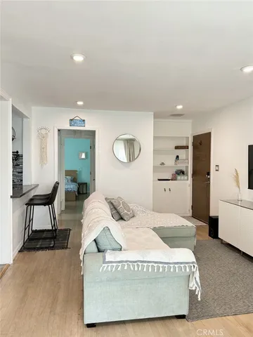 a bedroom with a bed and furniture