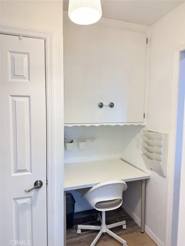 a bathroom with a tub a sink and a shower curtain