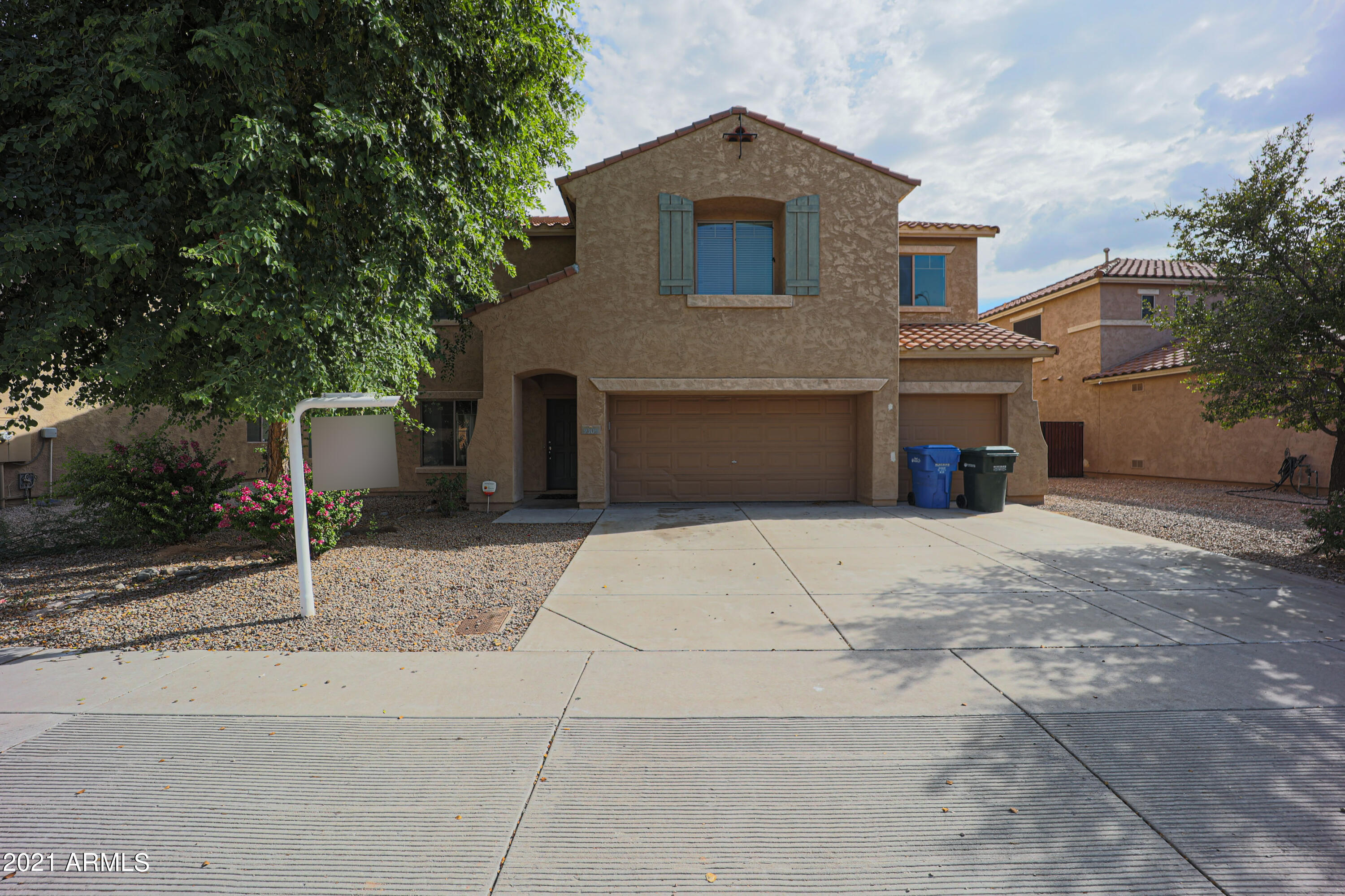 9309 West Rascon Loop Phoenix, AZ 85037 - Photo 1 of 32 Front Home