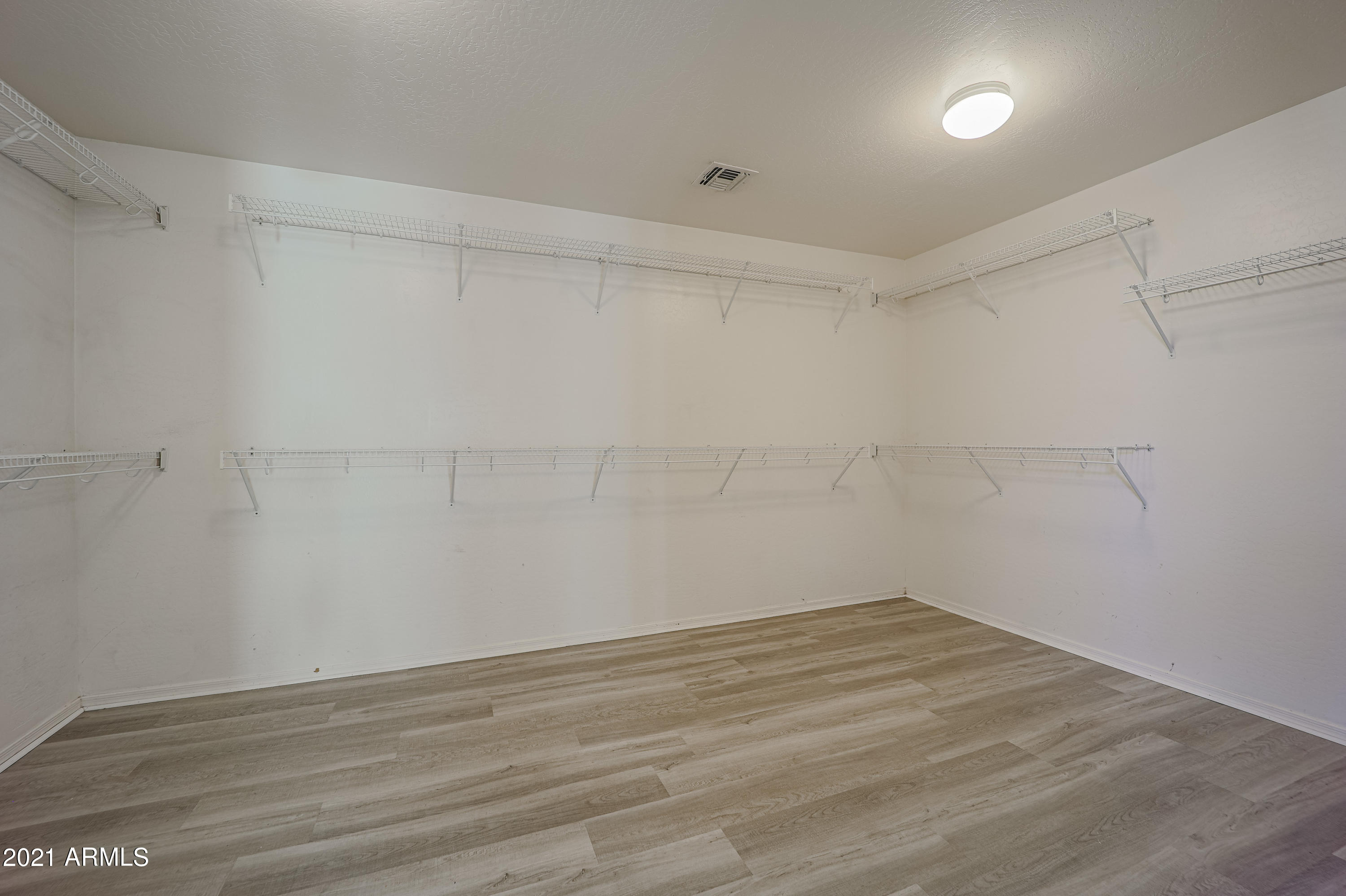 9309 West Rascon Loop Phoenix, AZ 85037 - Photo 20 of 32 master-closet